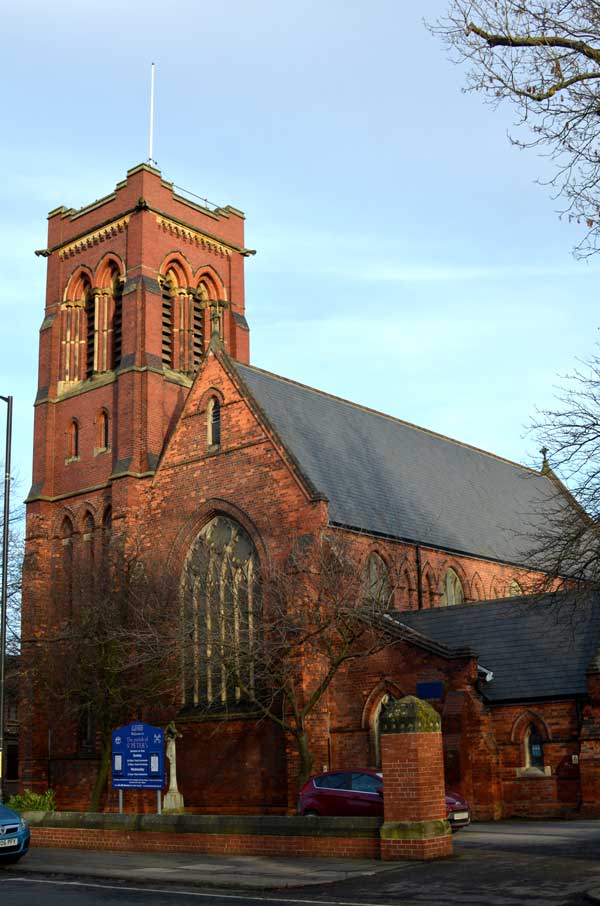 red brick church with square tower