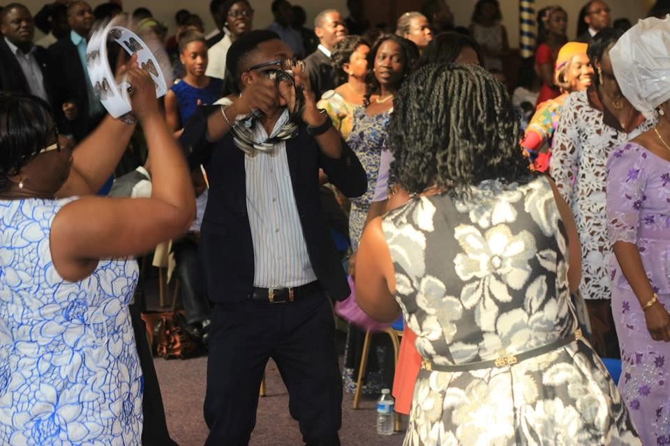 Black churchgoers dancing