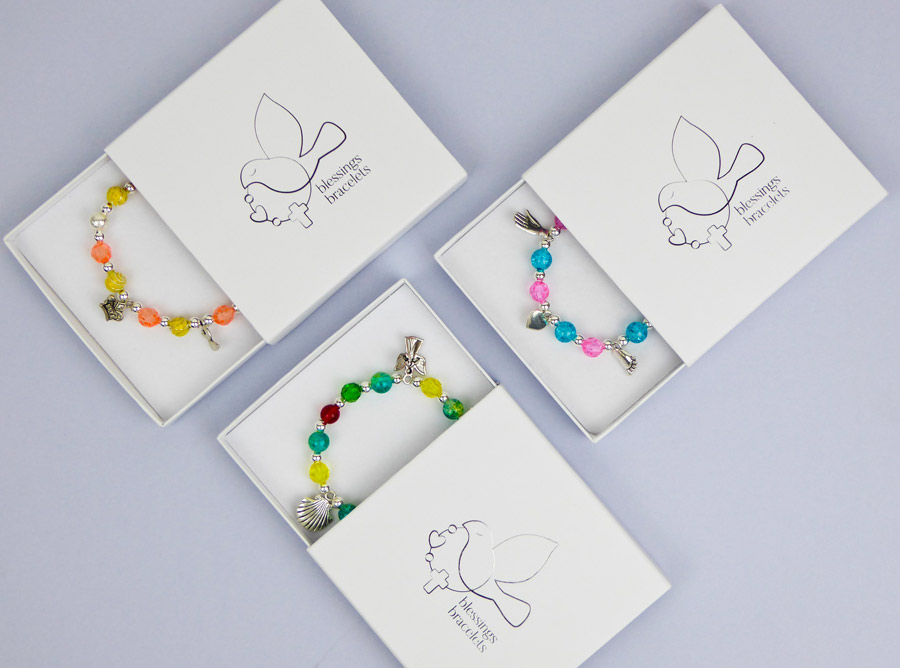 colourful bead bracelets in half-open boxes