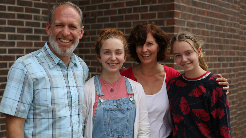 A smiling Peart family