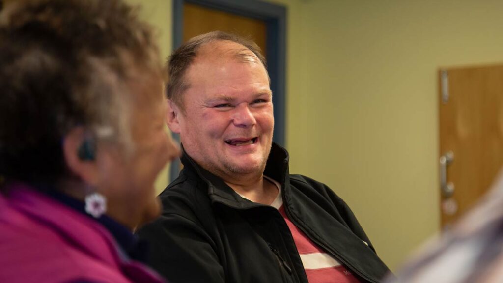 Steve laughing with other Thursday group members