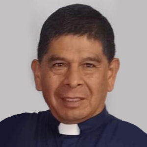 Joel Millanguir in clerical collar