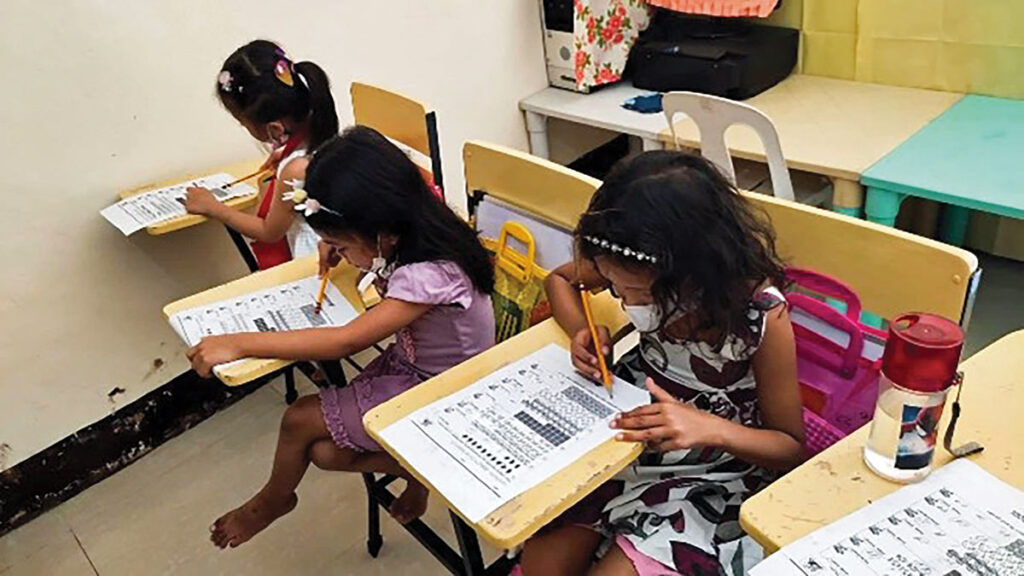 school-age girls study hard at a Jigsaw centre