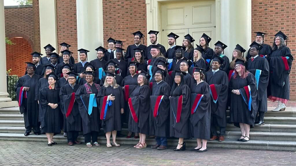graduating students in mortar boards and gowns