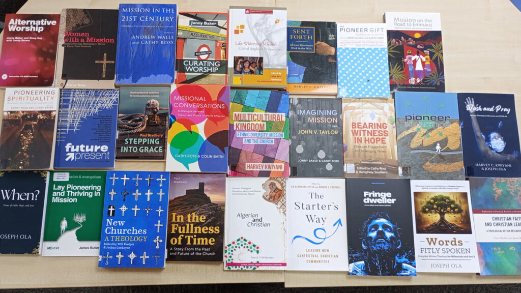 colourful selection of books covering table